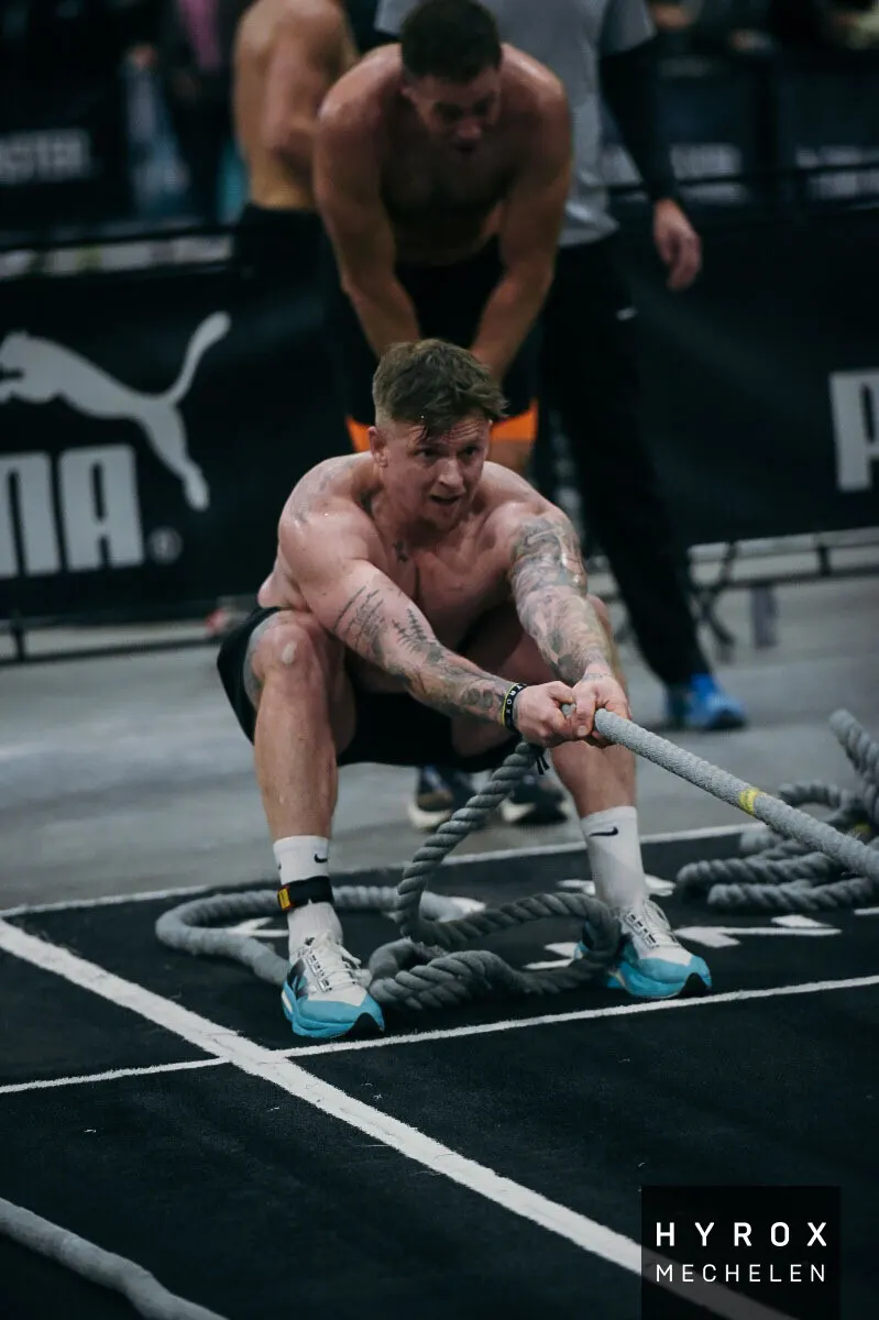 HYROX athlete on the battle ropes at HYROX Mechelen